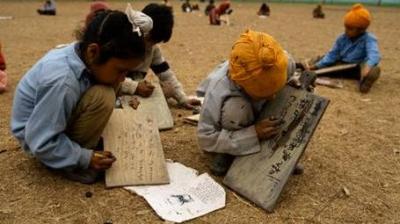 Children Writing on Slate
