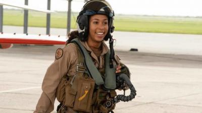 Became the first non-white female pilot in a US Navy fighter jet