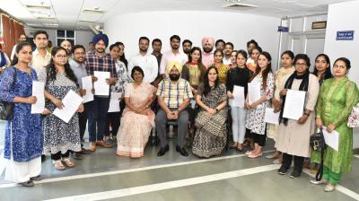 Sarkaria hands over appointment letters to assitant town planners and planning officers