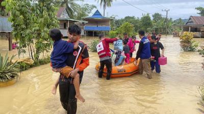 Flood and landslide hit Indonesia's Sulawesi island, killing 14