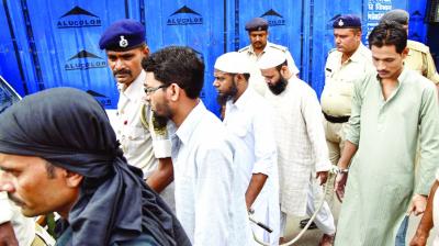 Police escorting accused