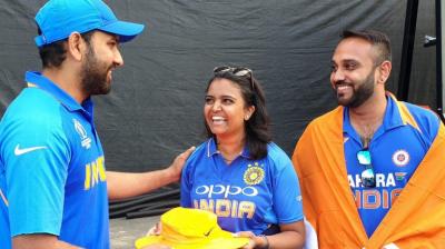 Rohit sharma indian fan meena given an autographed hat after hit by one of his sixes