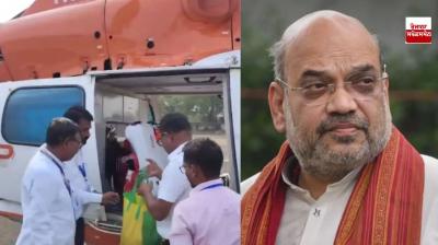 ਚੋਣ ਕਮਿਸ਼ਨ ਦੇ ਅਧਿਕਾਰੀ ਅਮਿਤ ਸ਼ਾਹ ਦੇ ਹੈਲੀਕਾਪਟਰ ਦੀ ਜਾਂਚ ਕਰਦੇ ਹੋਏ 