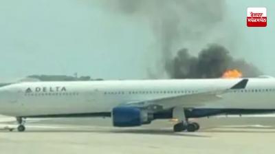Delta plane catches fire at Orlando airport