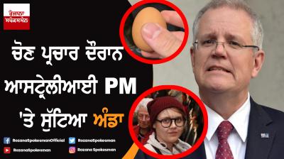 Protester bounces egg off head of Australian prime minister Scott Morrison 