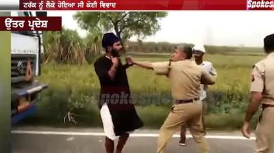Sikh truck driver confronted up police cops with his sword after pulled his beard