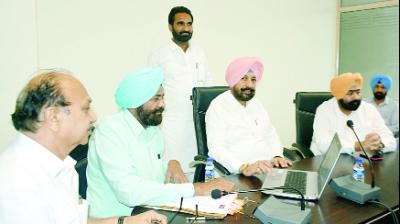 Balbir Singh Sidhu Presiding over meeting