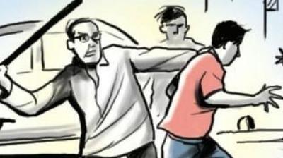 People beating Dalit