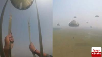 600 military paratroopers fly in the sky 