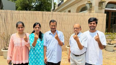 Arvind Kejriwal voted along with his family