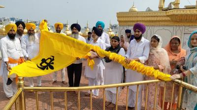 In the Harmandir Sahib the saffron-colored Nishan Sahib was removed 