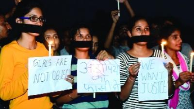 Girl doing Candle March For Justice