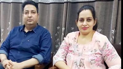 Jailed lawyer's wife suspended from education department