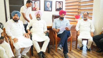 Amrinder Singh Raja Warring and Others