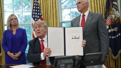 Trump signs executive order to end migrant family separation at border