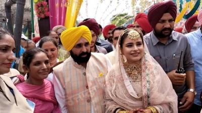 CM Mann and Dr Gurpreet Kaur at Village Satoj