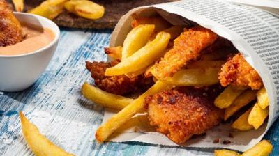 Food Wrapped In Newspapers