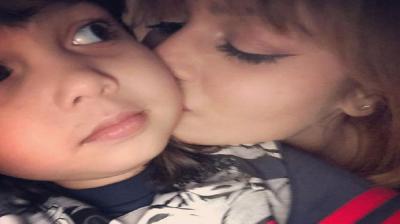 Ayesh Takia with son