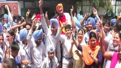 Saravjot Singh Bansal got rank one in 12th Class