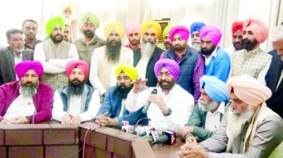 Sukhpal Singh Khaira and Colleague Talking to the Media