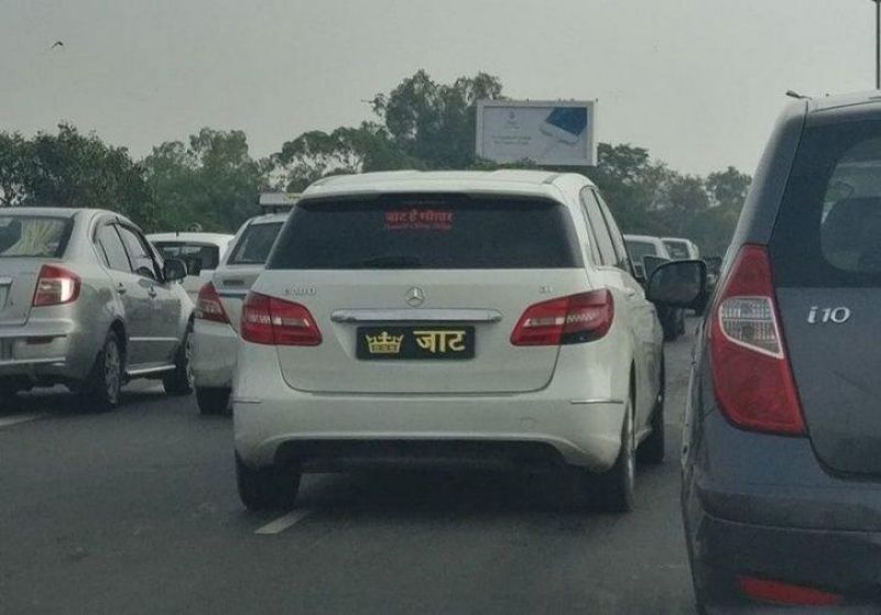 Traffic fines for car stickers, religious, caste, profession, political party display