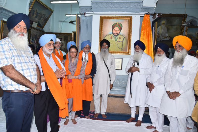  Pictures of seven personalities including martyrs of Behbal Kalan Golikand adorned in Central Sikh Museum