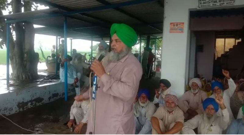 Family members and villagers in the rain to bring justice to Lovepreet