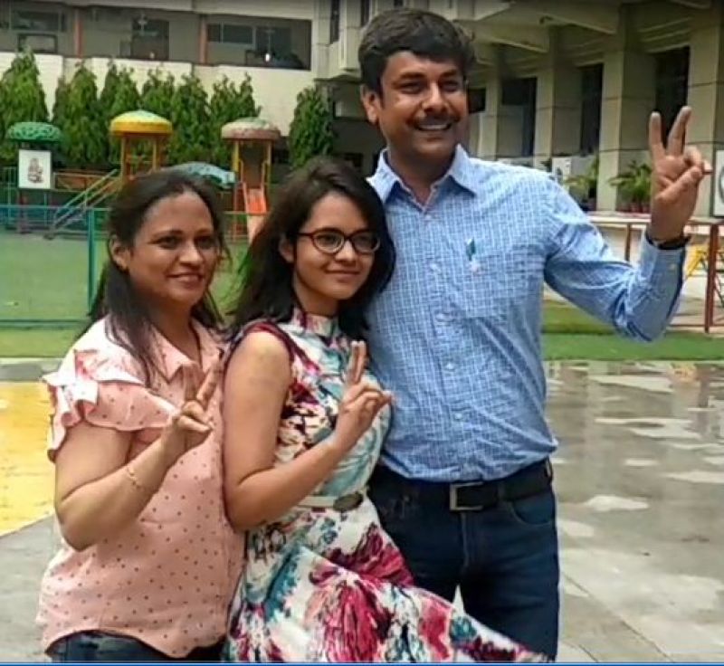 Ridham Singla with her parents