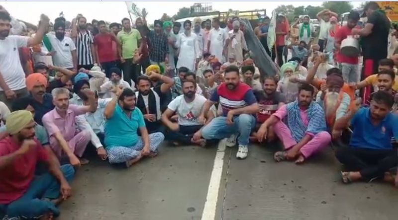 Family members and villagers in the rain to bring justice to Lovepreet