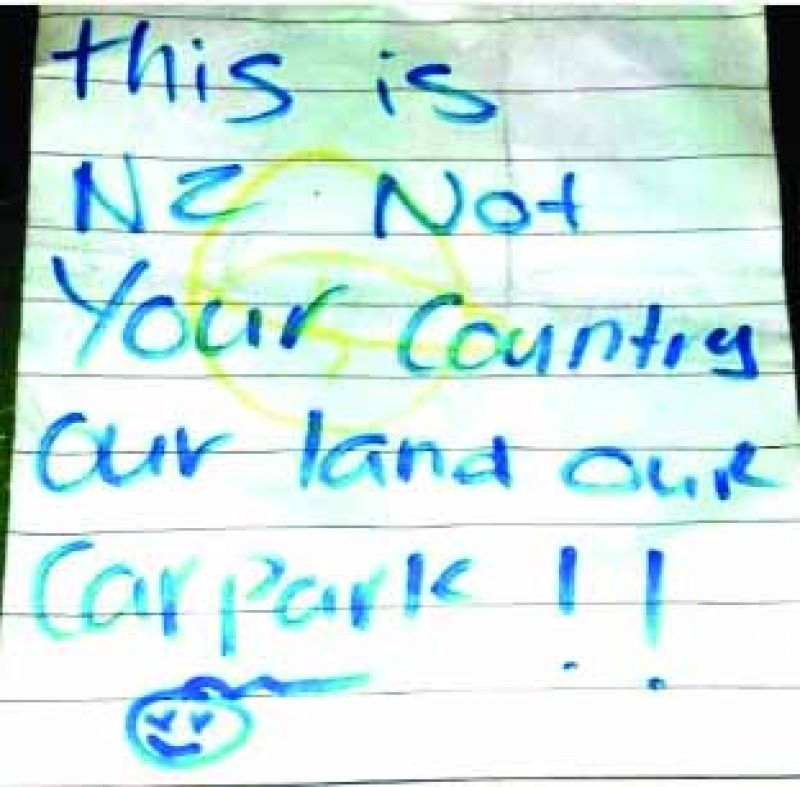 Racial threat to café owner