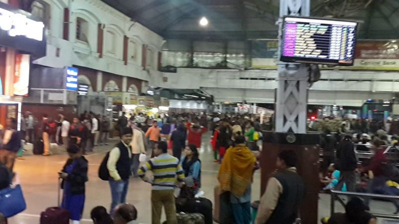 Travelers at railway station
