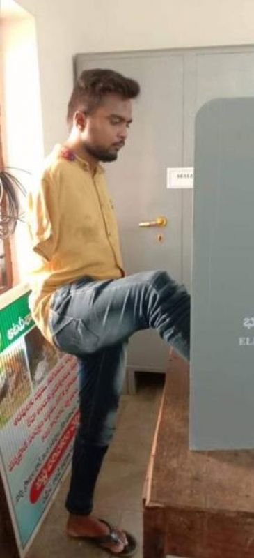 Zakir Pasha vote using his foot