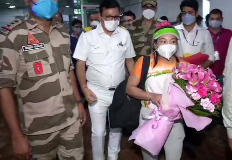 Olympic silver medalist Mirabai Chanu arrives at the airport from Tokyo