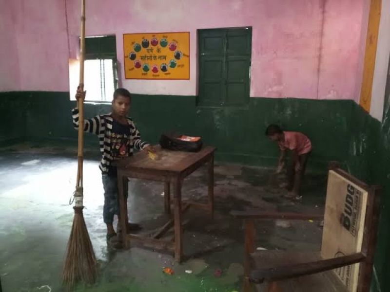 Journalist arrested after taking pictures of kids mopping school floor