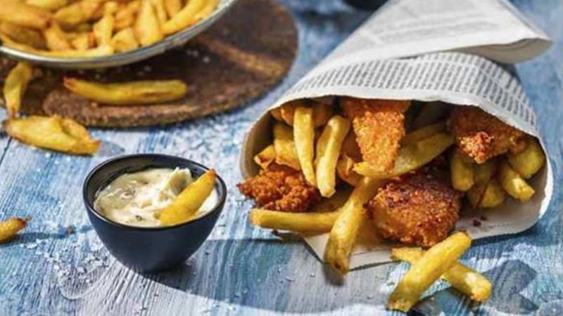 Food Wrapped In Newspapers