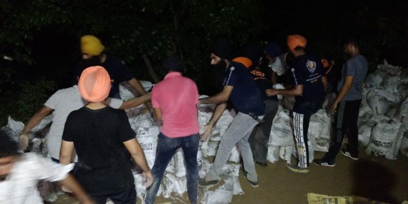 Khalsa Aid, Sikh Relief UK & other organizations came together to help flood victims