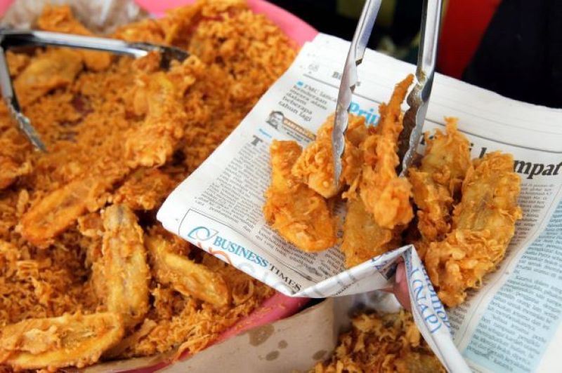 Food Wrapped In Newspapers