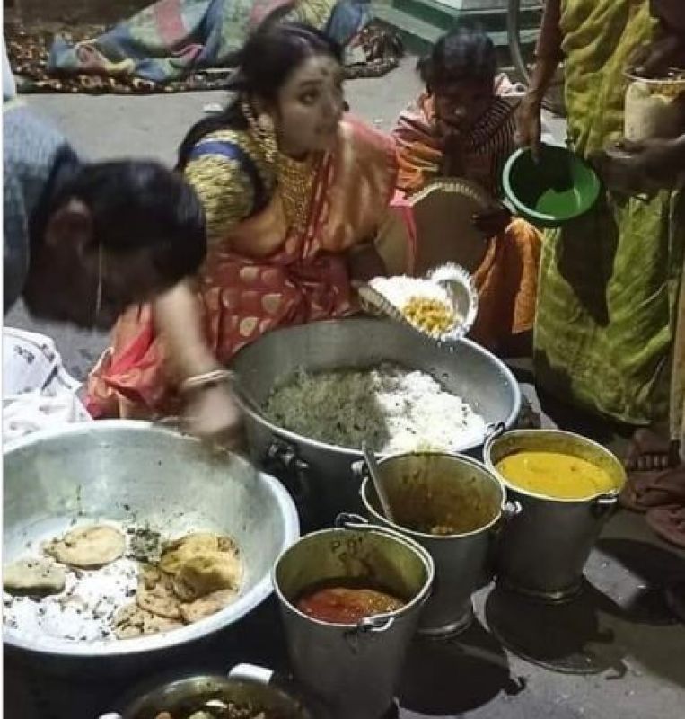 Woman Distributes Leftover Food From Brother's Wedding To The Needy