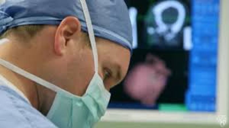 patient keeps doing video chat brain tumor surgery