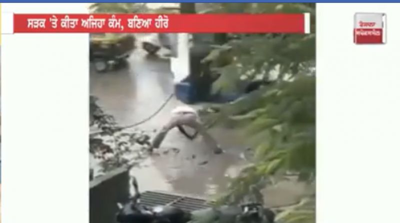 This traffic cop fixes potholes on roads