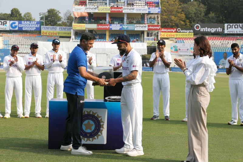 Virat Kohli felicitated with a special cap by India coach Rahul Dravid on his 100th Test