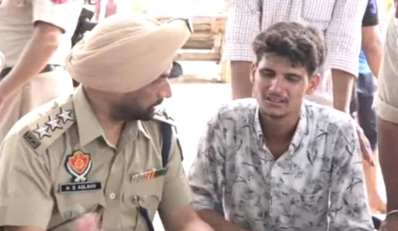 Harmanjit Singh with police 