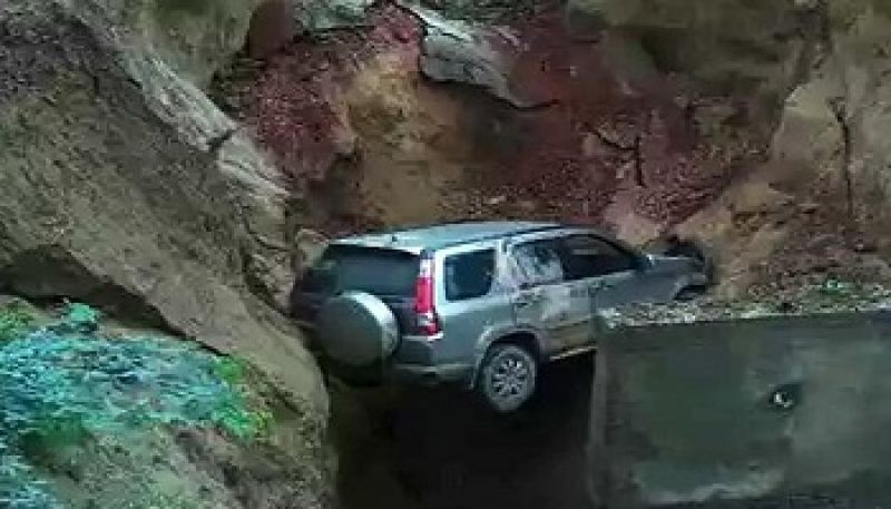 SUV Falls Into Ditch