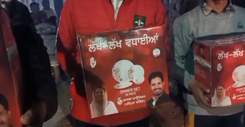 Congress candidate distributed dinner sets to voters
