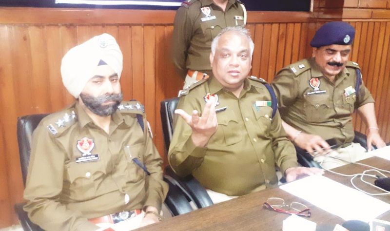District Police Chief Sandeep Goyal at press conference