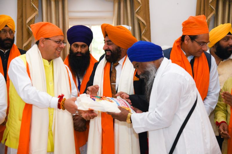 CM Pushkar Singh Dhami participated in 'Akhand Path' organised by Governor 