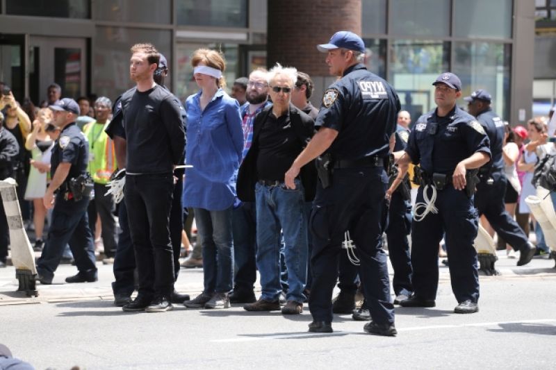 Police arrest 70 climate change protesters