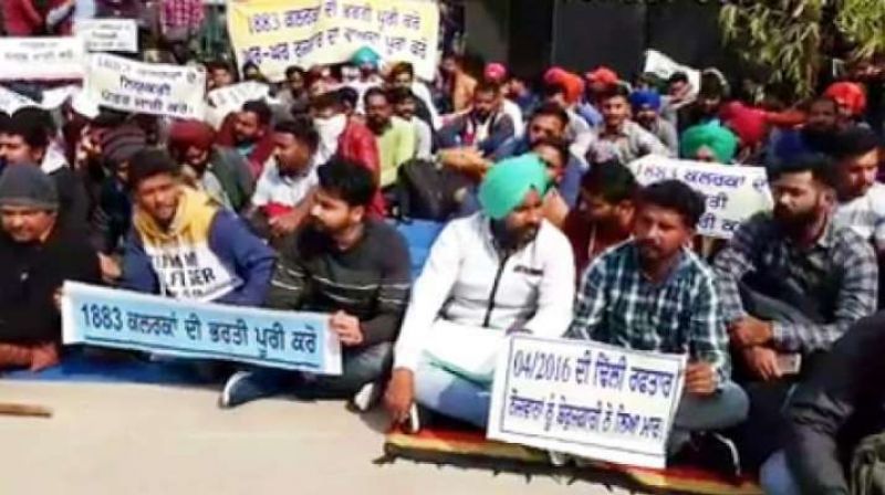 Clerk test pass candidates protest