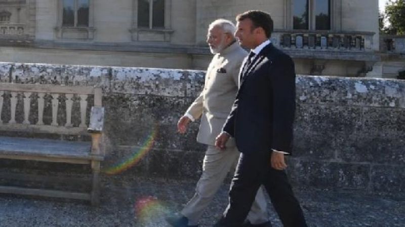 Emmanuel macron shows pm narendra modi france famous historic building 