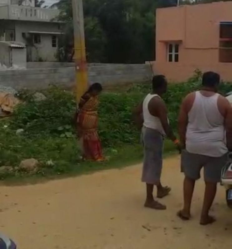 7 arrested for tying woman to pole, harrasing her